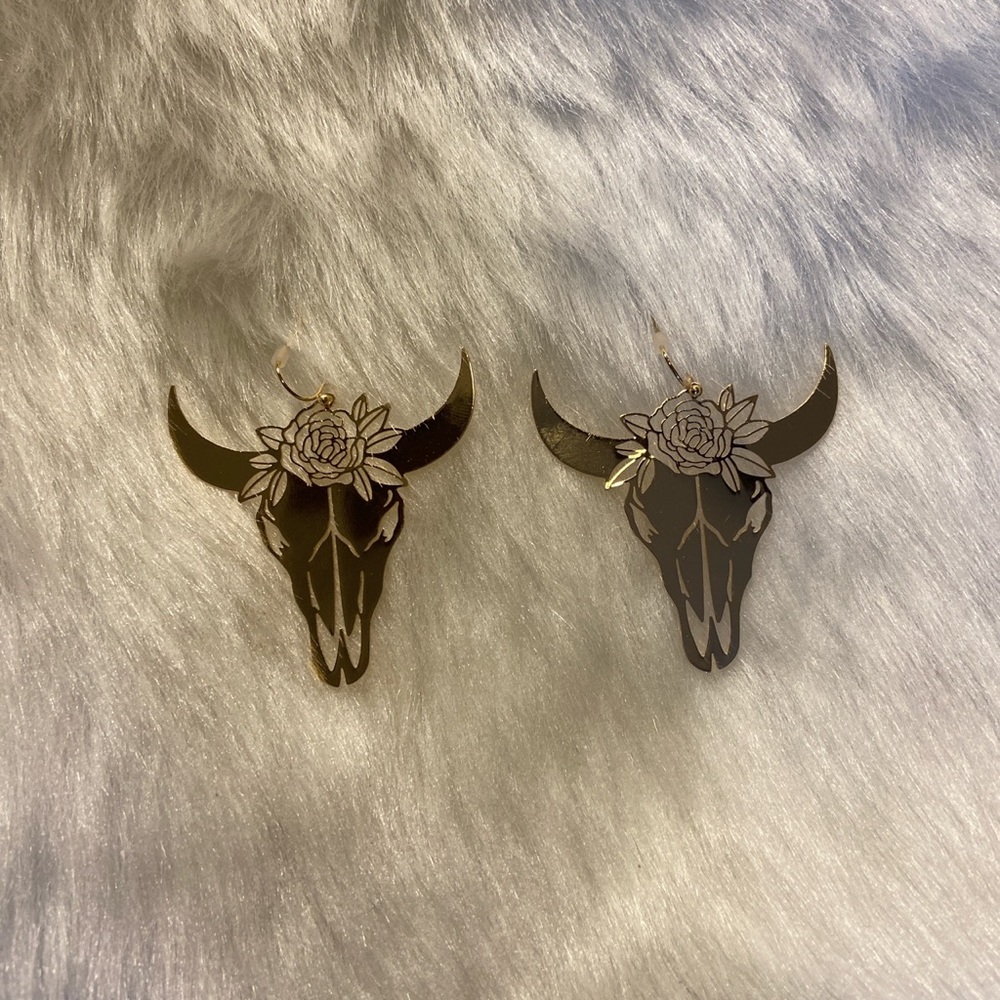 Beautiful gold flower bull earrings